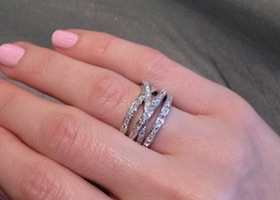 a promise ring on a woman's hand