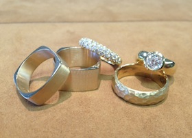 group of wedding rings on display